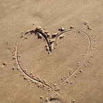 Hearts in The sand at the beach photographed by Armenyl