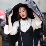 Chriselle Lim in the rain at Louis Vuitton show in Paris Street style at Louis Vuitton FW 16 show in Paris on March 9th photographed by Armenyl.com