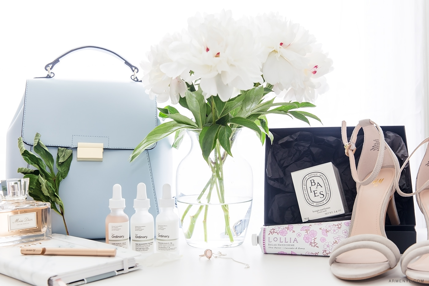 Armenyl favorites Zara Bag, Peonies, Baies Candle Diptyque, The Ordinary skincare, Lolia photographed by Armenyl.com