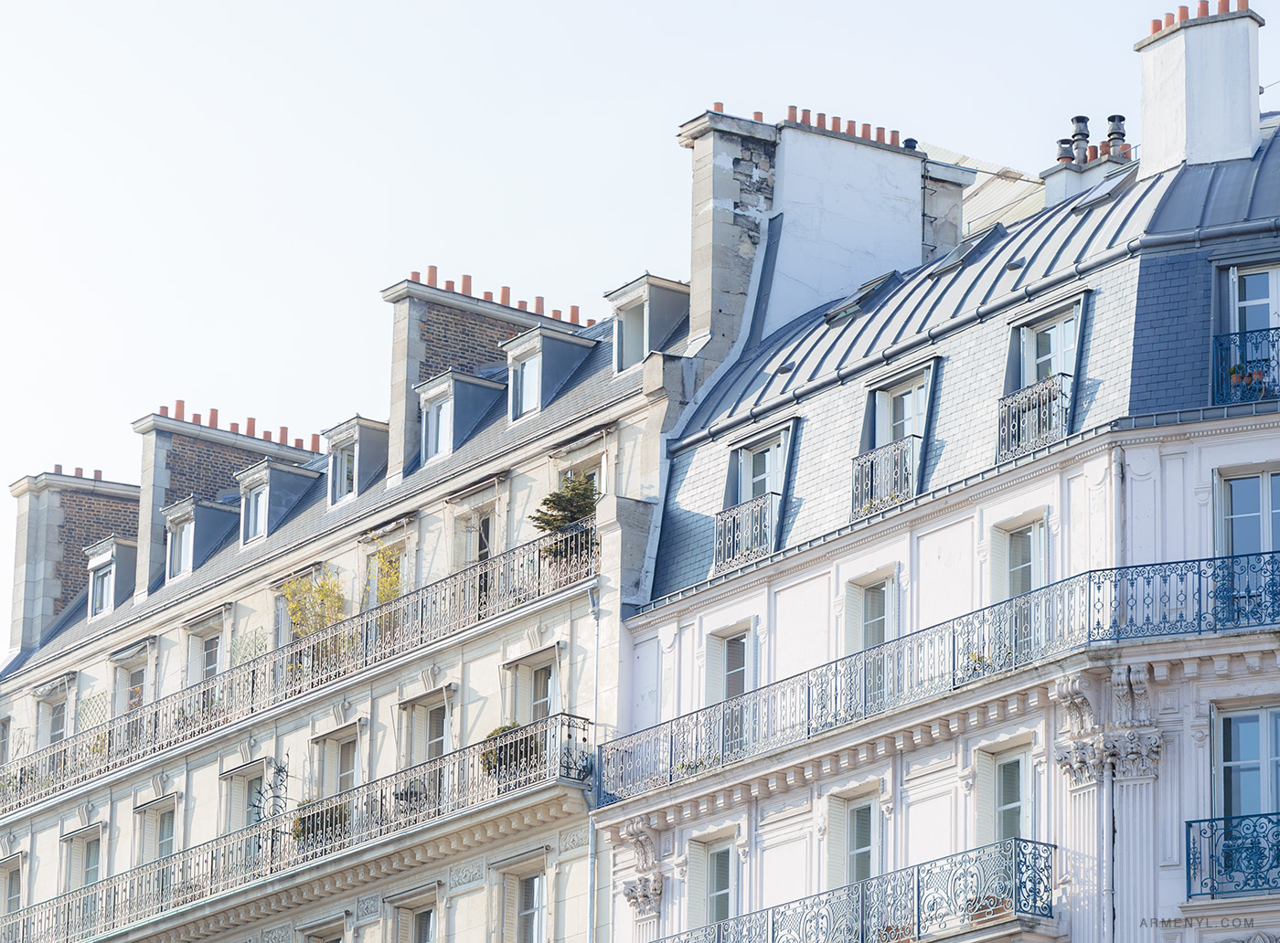 Parisian-buildings-and-rooftops-Sunny-day-in-Paris,-France-photographed-by-Armenyl.com