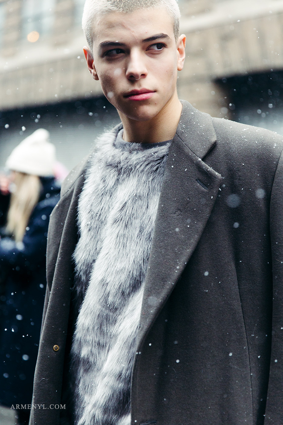 Menswear Street style and fashion look gray fur sweater and gray coat at New York Fashion Week photographed by Armenyl.com 