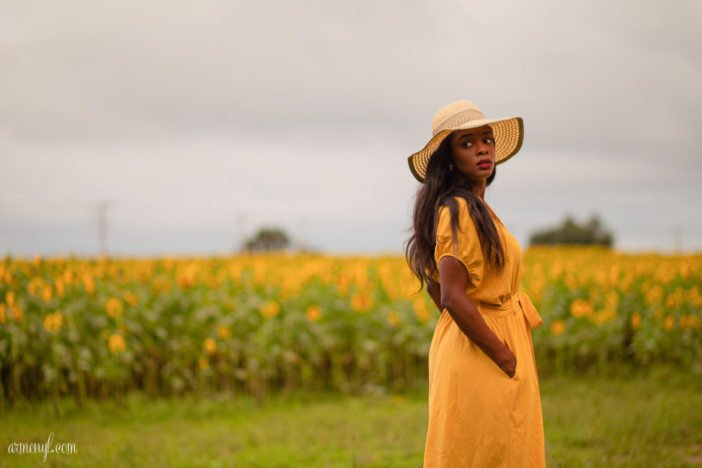 A travel through fashion Self Portrait series by Armenyl featuring the sunflower fields in Jarretsville Maryland.
