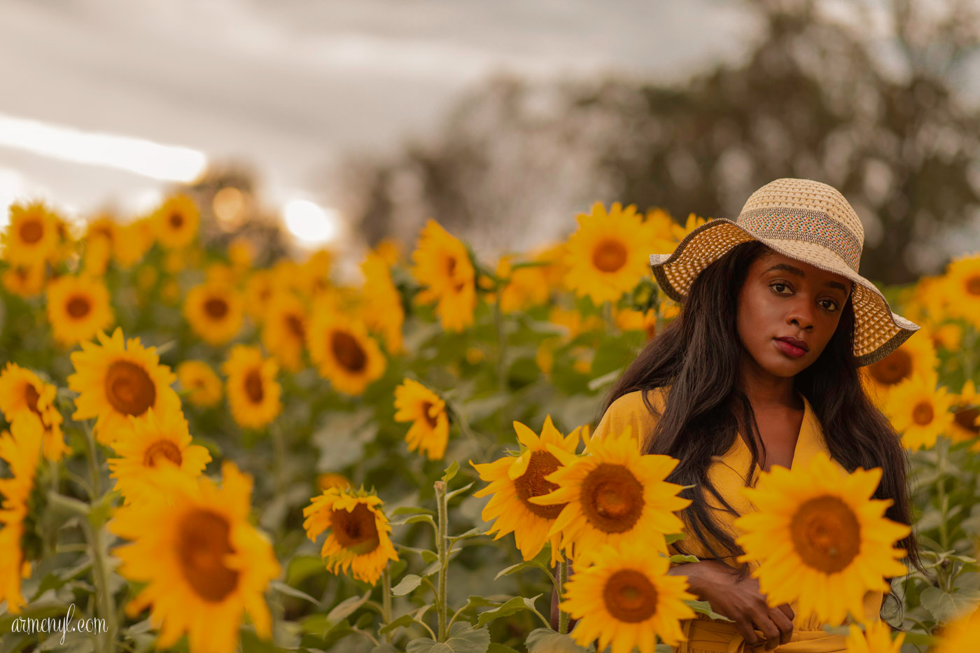 A travel through fashion Self Portrait series by Armenyl featuring the sunflower fields in Jarretsville Maryland.